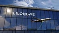 Airplane landing at Lilongwe Malawi airport mirrored in terminal