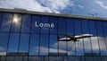 Airplane landing at Lome Togo airport mirrored in terminal