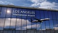 Airplane landing at Los Angeles mirrored in terminal