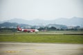 Airplane landing on runway go to station for send and recive passengers at Jieyang Chaoshan International Airport