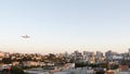 Airplane landing, San Diego airport California USA. Plane arriving, city skyline Royalty Free Stock Photo