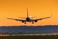 Airplane landing Stuttgart airport sun sunset vacation holidays Royalty Free Stock Photo