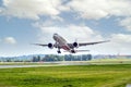 Airplane landing in the Vaclav Havel Airport in Prague, Czech Republic Royalty Free Stock Photo