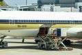 An Airplane Loading Air Cargo Containers After Flight At Changi Airport, Singapore. Royalty Free Stock Photo