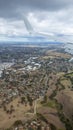 Airplane lowering altitude to below cloud level and approaching a local airport