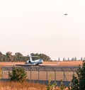 Airplane making landing on the runway Royalty Free Stock Photo