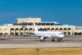 Airplane near to the main building of Malta International Airport Maltese Islands.. Luqa, Malta 14 May, 2019