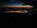 Airplane night view. Wing siluette Royalty Free Stock Photo