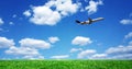 Airplane over grassy field Royalty Free Stock Photo