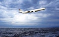 Airplane over the ocean