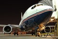 Airplane parked at the airport Royalty Free Stock Photo