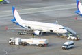 Airplane parking airport during service before the flight Royalty Free Stock Photo