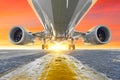 Airplane in the parking lot of the airport apron, bottom view hdr of engines, fuselage and wings. Against the background of the sk Royalty Free Stock Photo