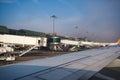 Airplane passenger boarding ramps in Izmir Adnan Menderes Airport. Editorial shot in Izmir Turkey