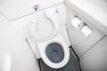 Airplane passenger lavatory toilet seat and water wash basin