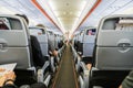 Airplane with passengers on seats waiting to take off Royalty Free Stock Photo