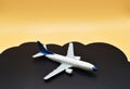 Airplane passing over the clouds, clear background. Concept of travel by plane Royalty Free Stock Photo