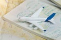 Airplane on passport pages with a visa. Close up Royalty Free Stock Photo