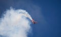 Airplane performig in airshow Royalty Free Stock Photo