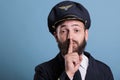 Airplane pilot showing silent gesture