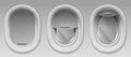 Airplane portholes with open and closed shade Royalty Free Stock Photo