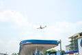 Airplane preparing for landing at Don Mueang International Airport over the cityin Thailand