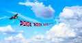 Airplane pulling British flags, union jack