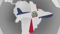 Airplane puzzle featuring flag of the Domican Republic against the world map. Tourism conceptual 3D rendering