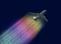 Airplane with a rainbow contrails Royalty Free Stock Photo