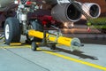 Airplane ready for push the back the cart tow tracktor on the front landing gear of the chassis. Royalty Free Stock Photo