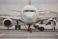 Airplane refueling on the runaway. Transportation industry. Fuel supply Royalty Free Stock Photo