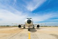 Airplane and road. Landscape with big white passenger airplane i Royalty Free Stock Photo