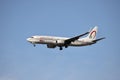 A airplane of Royal Air Maroc flying in the sky