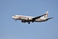 A airplane of Royal Air Maroc flying in the sky