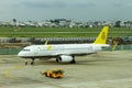 An Airplane Of Royal Brunei Airlines Airbus A320 Moved To Taxiway By Pushback Tractor In Tan Son Nhat International Airport.