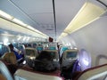 Airplane`s cabin with passengers Royalty Free Stock Photo