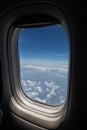 Airplane seat and window inside an aircraft Royalty Free Stock Photo
