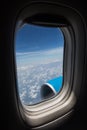 Airplane seat and window inside an aircraft Royalty Free Stock Photo