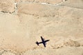 Airplane shadow above the desert