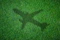 Airplane shadow on green field Royalty Free Stock Photo