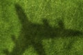 Airplane shadow on green field Royalty Free Stock Photo