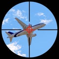 Airplane in the sight of anti-aircraft weapons. Missile defense system aimed at passenger plane in the sky. The unidentified plane Royalty Free Stock Photo