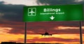 Plane landing in Billings Montana, USA airport with signboard Royalty Free Stock Photo