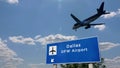 Plane landing in Dallas DFW with signboard Royalty Free Stock Photo