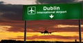 Plane landing in Dublin with signboard