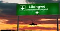 Plane landing in Lilongwe Malawi airport with signboard