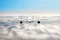 Airplane in the sky above the clouds flight journey sun height speed motion blur. Royalty Free Stock Photo