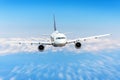 Airplane in the sky above the clouds flight journey sun height speed motion blur. Passenger commercial aircraft.