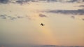 Airplane in the sky background. Airplane takeoff in sunset sky Royalty Free Stock Photo