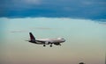 Airplane in the sky and clouds. cloudy day, the plane is going to land